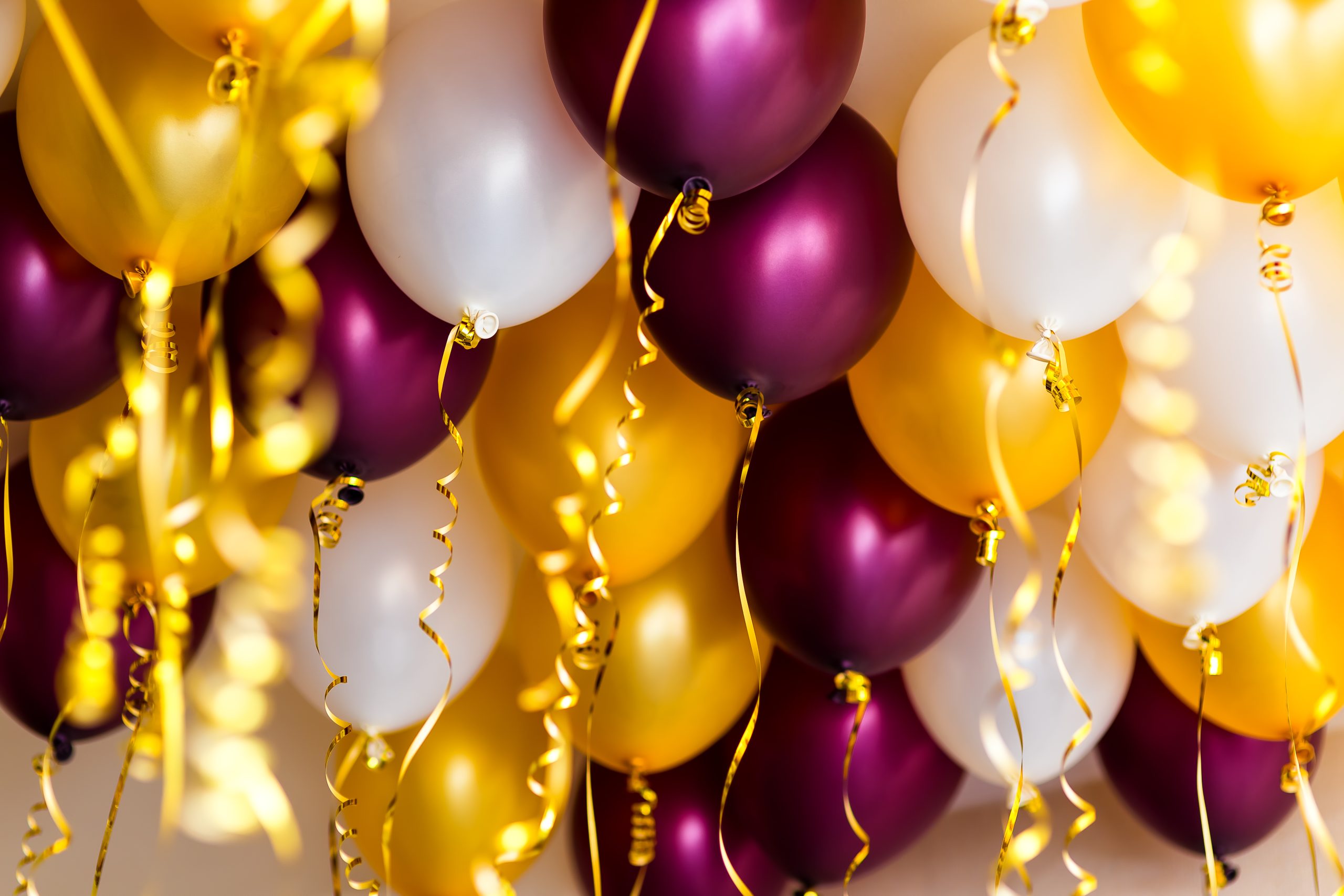 colourful balloons, golden, white, red streamers isolated on white